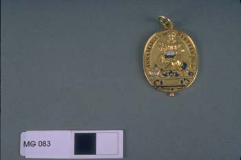 Gold baptismal medal