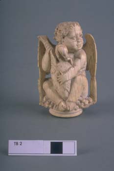 Carving, ivory putto