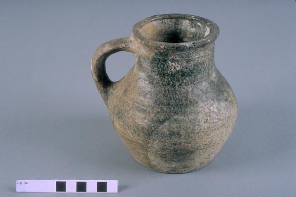 Partially glazed jug