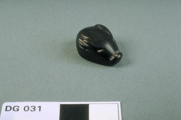 Carving, head of an animal