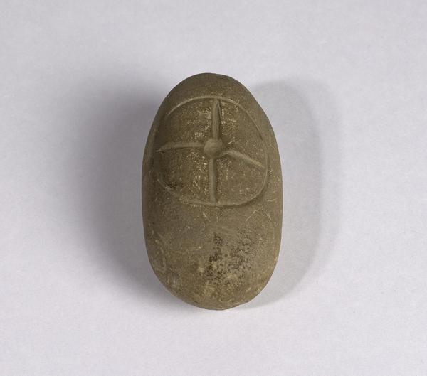 Small cross-inscribed pebble