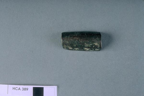 Unidentified (fragments, of weapon or tool ?)