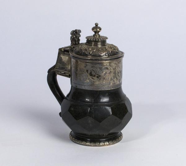 Stoneware jug with silver mounts