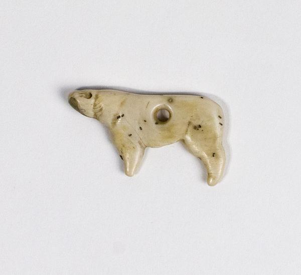 Stone figure of a dog or wolf